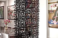 20 black laser cut decorative screen to divide the kitchen and the dining zone