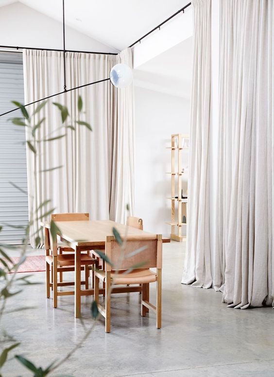 cream curtains hide the large storage space