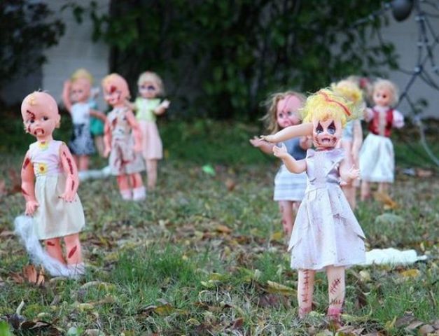decorate old dolls and create a zombie doll backyard for cheap