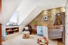 25 this neutral nursery is accentuated with exposed brick