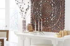 26 carved wood wall art panel is a bold piece and is organic