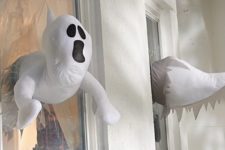 27 window crasher ghosts that appear inside and outside will give your window decor a new dimension