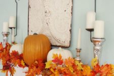 29 lush fall leaf garland can turn your mantel into a bold one