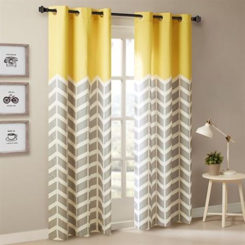 yellow and grey chevron printed curtains create a mood