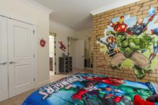 31 faux brick wall with Avengers for little comics fans