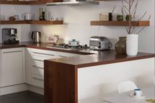 31 warm-colored wood countertop ties up the whole kitchen decor