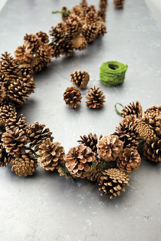 this rich pinecone garland can be used both indoors and outdoors as pinecones are durable