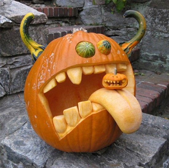 viking pumpkin with horns eating another one