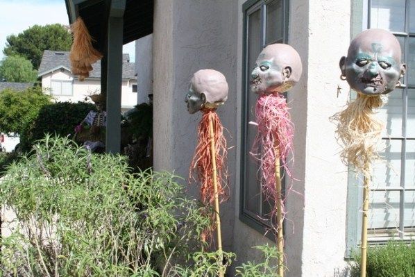 such funky tiki torches is a quite cool addition for your outdoor Halloween decor