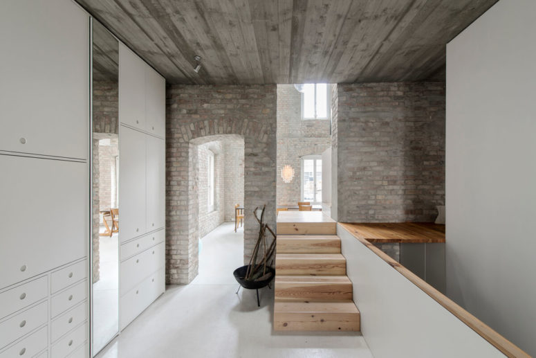 Historic brick walls are left untouched, and the ceilings are wooden, the rooms are spacious with double height ceilings Historic brick walls are left untouched, and the ceilings are wooden, the rooms are spacious with double height ceilings