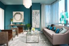 02 a teal accent wall, aqua blue accessories and brown upholstered furniture