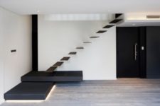 03 Simple black and white color scheme is enlivened with lighting