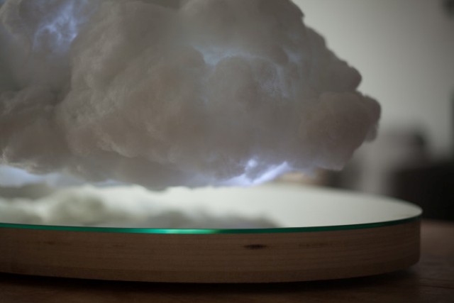 The cloud can rotate and move above and below and float without any support 1-2 inches above the base