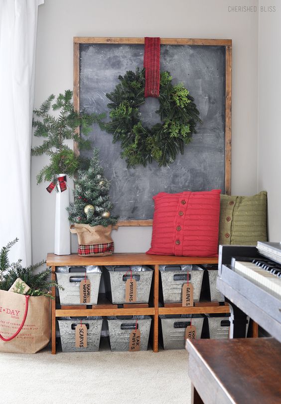 hang an evergreen wreath and place faux tree for Christmas-like entry