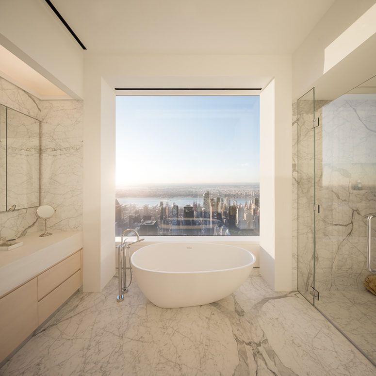 bathroom with a view The master bathroom features an amazing view but seems simple but it's not because of adorable marble used for decor