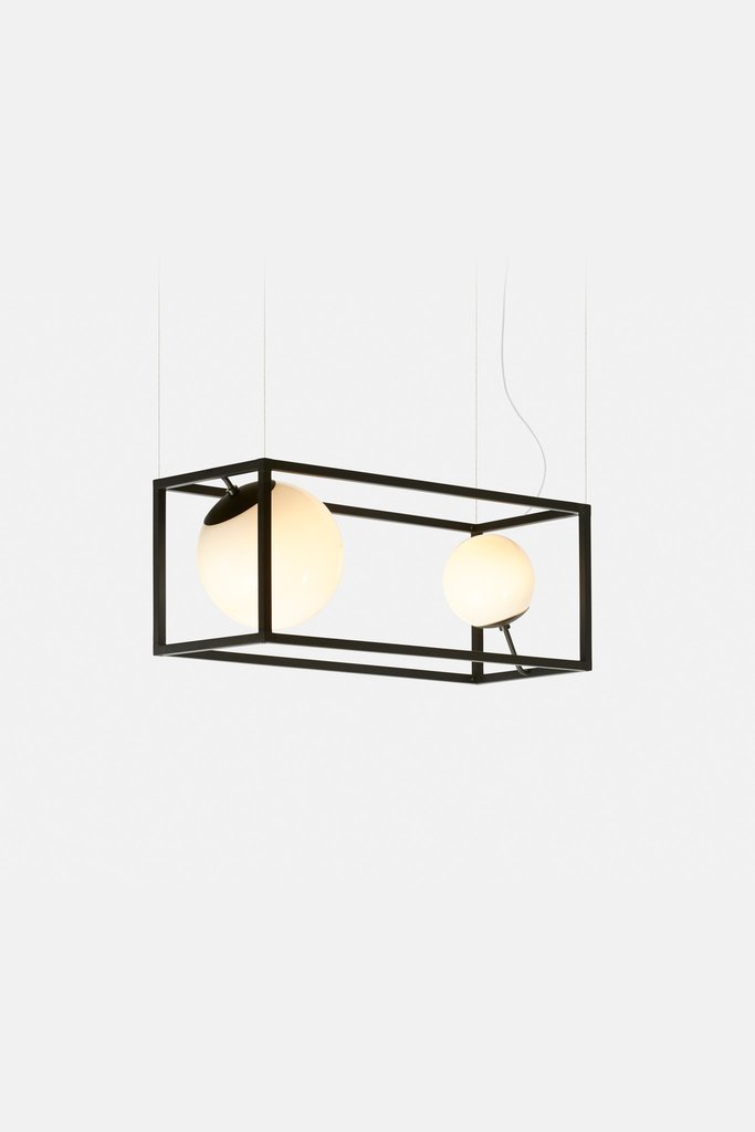 long lamp Witt 2 is a lamp that is longer and there are two spheres, it's a fresh take on a traditional chandelier
