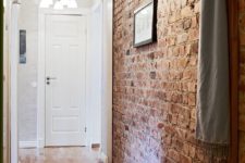 04 narrow entryway with a brick wall that adds texture
