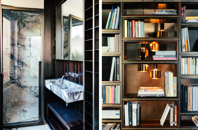 The bathroom is clad in white marble, the beauty and chic isn't in whimsy design but in rich materials