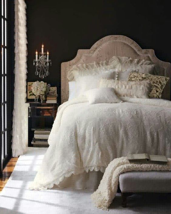 dark vintage bedroom with crystal wall lamps