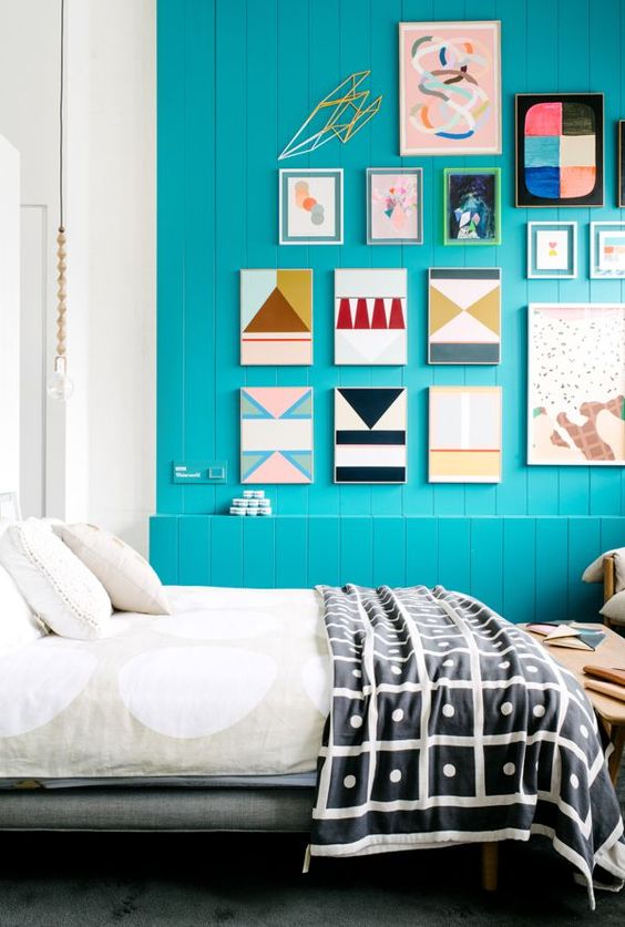enliven your bedroom with a bold turquoise plank wall