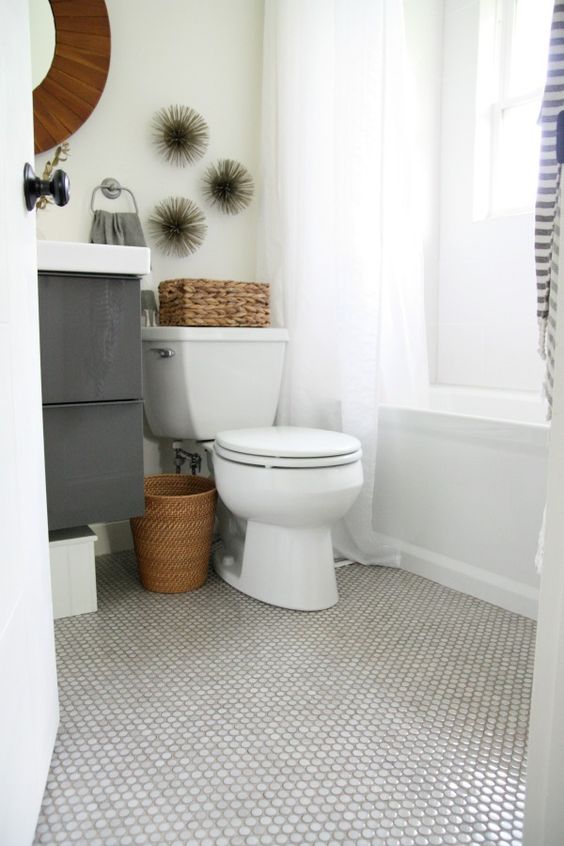 marble penny tile floor will be gorgeous for any neutral or serene bathroom