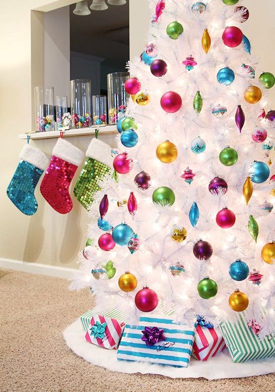 if you love bold colors, rock a pure white tree with bold ornaments to accentuate them