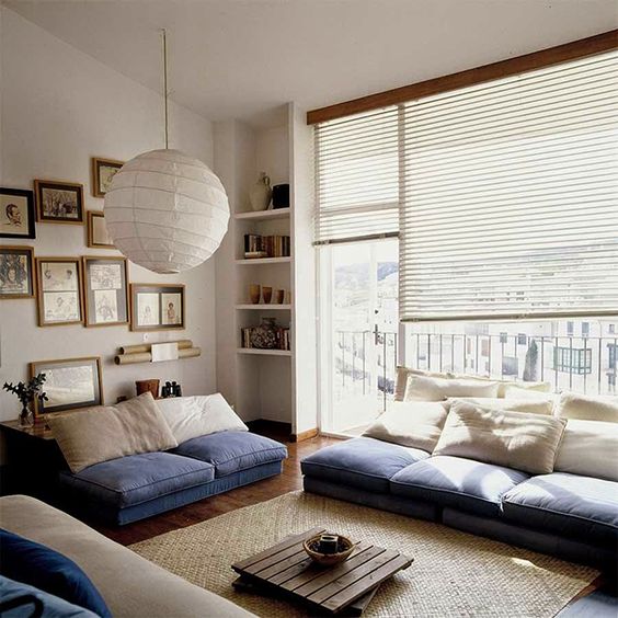 light living room in cream with blue accents