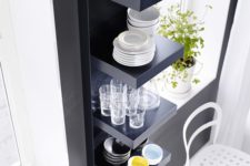 put your dinnerware and drinkware on display with black Lack shelves