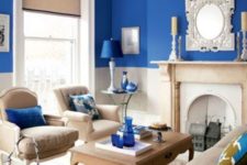 08 beautiful beige room with splashes of bright blue and a bright blue acent wall