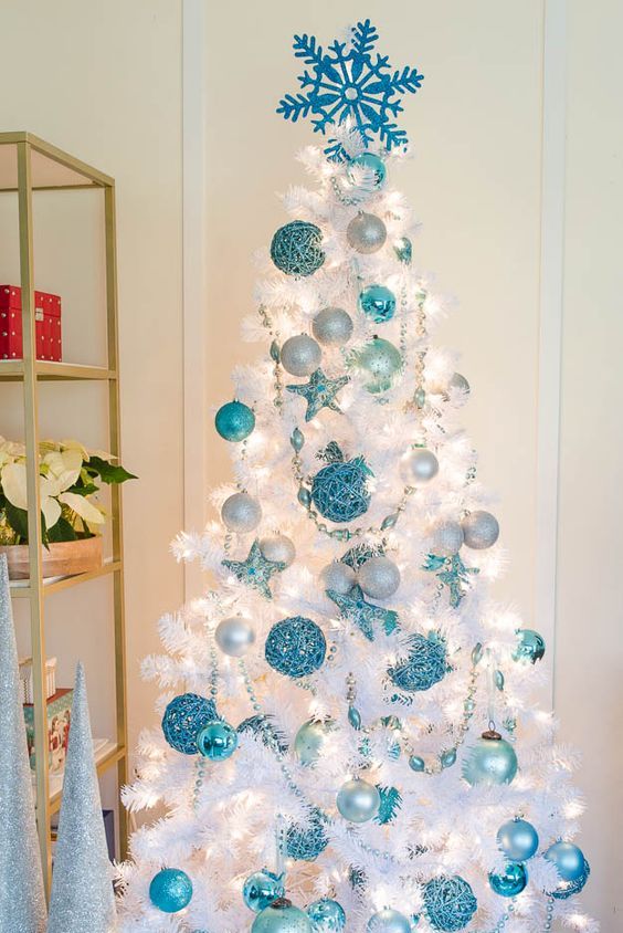 pure white trees look amazing with blue ornaments of various shades