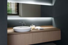 11 minimal countertop washbasin and gorgeous hidden lighting behind the mirror