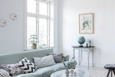 12 light-filled room with a mint green sofa