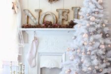 12 white tree with soft pastel ornaments and natural pinecones for balanced decor