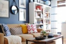 13 brown and beige furniture, a bold blue accent wall for an eye-catchy look