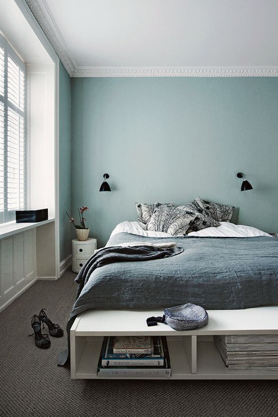 Scandinavian bedroom spruced up with a mint headboard wall
