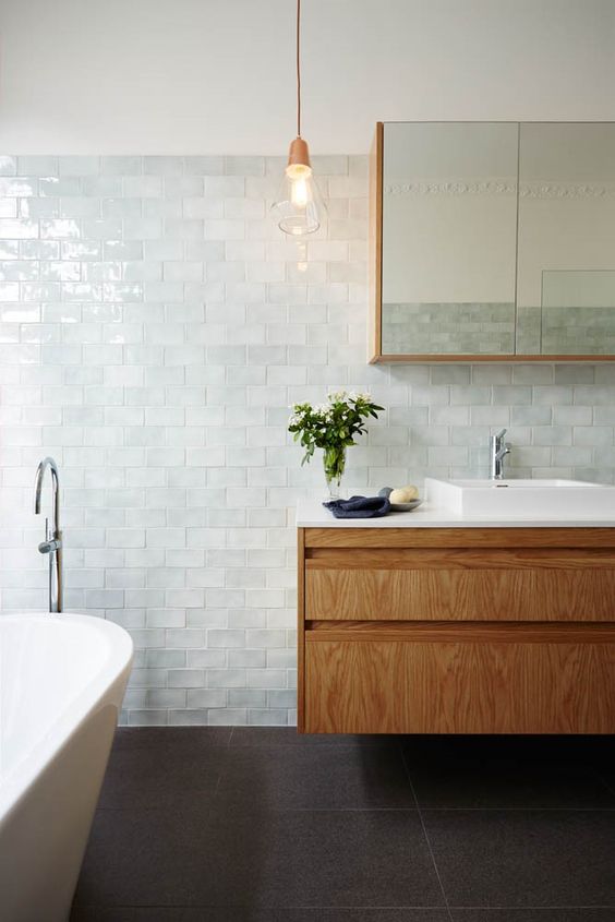 very pale aqua tiles for creating a relaxing serene bathroom look
