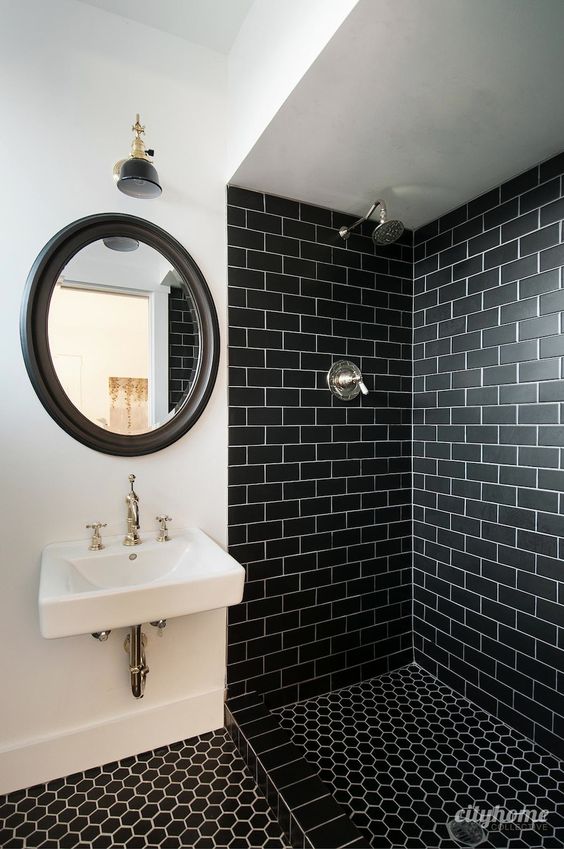 black subway tiles in the shower for a masculine bathroom