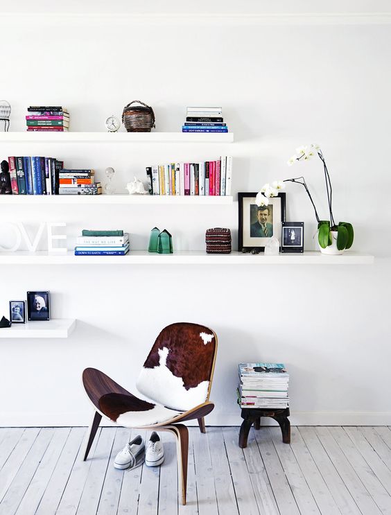 calm mid-century modern space with Lack shelves for storage