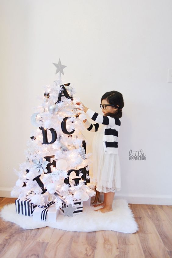 little white tree with black monogram letters to teach your kid alphabet