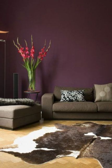 aubergine accent wall is a great way to make the space more refined and moody