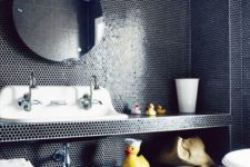 18 bathroom with dark blue floor-to-ceiling penny tile