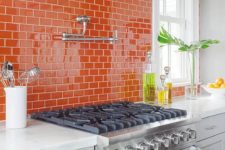 19 bold orange kitchen backsplash and wall covered in offset pattern