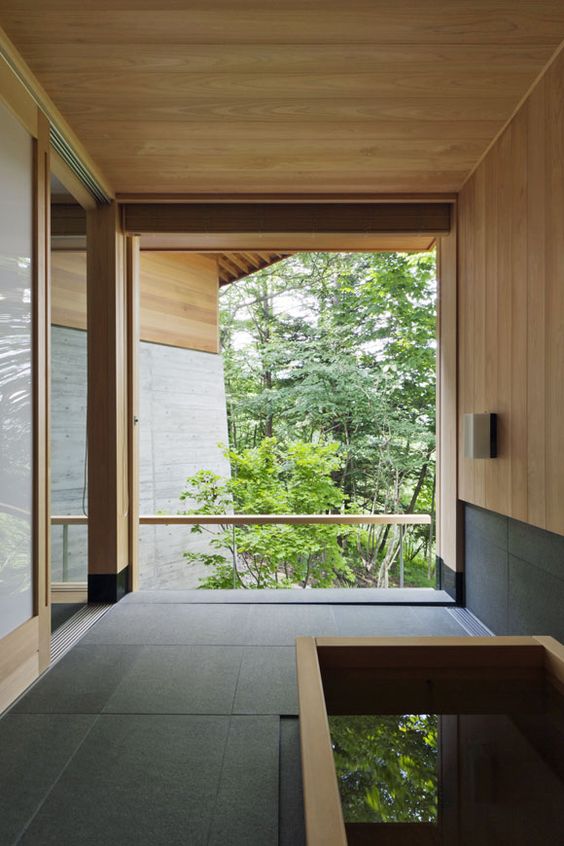 traditional square soaking tub and a view to enjoy is a perfect bathroom combo