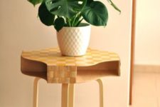 26 Ikea FROSTA stool, Ikea NASUM basket and you got yourself a very stylish plant stand with storage