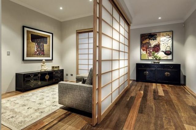 Shoji screens and Japanese wall art give the serene interiors an oriental touch