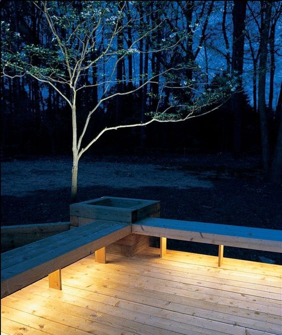 installing lights under benches bathes your deck in a warm glow