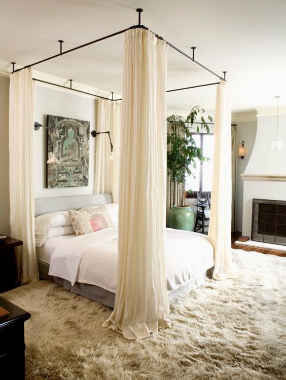 ivory curtains aren't only a soft addition, they also add privacy to the space