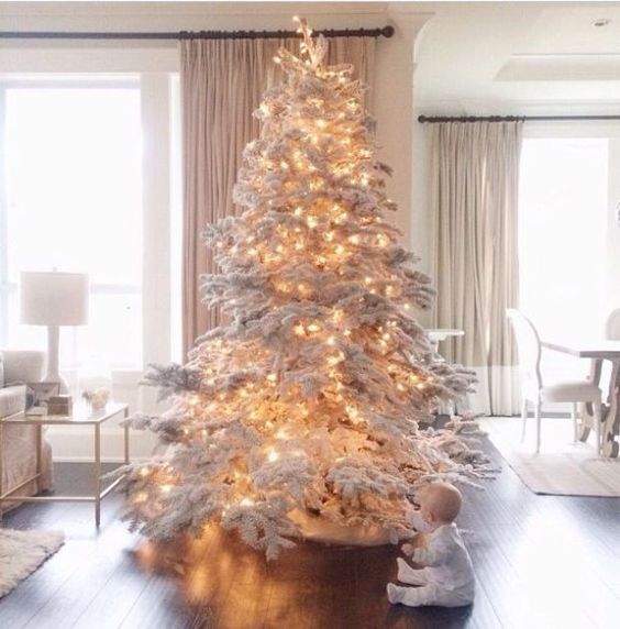rock a snowy tree with only lights for an incredible holiday look