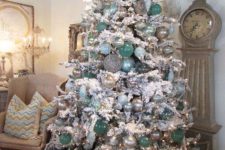 28 snow white tree with aqua and silver ornaments