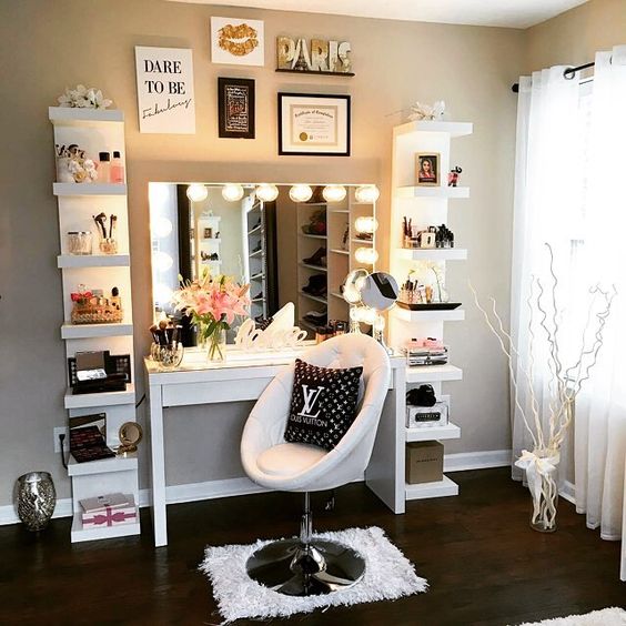 Lack makeup station with a makeup desk and a lit mirror